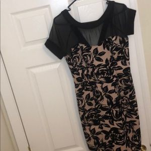 nude pink and black dress